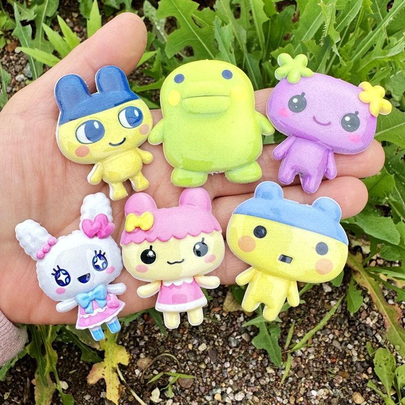 45mm Cartoon Tamagotchi double - đánh giá và giá Phone Accessories Beads